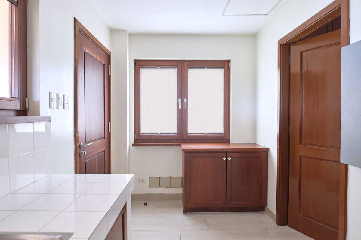 Dirty kitchen with built-in cabinet