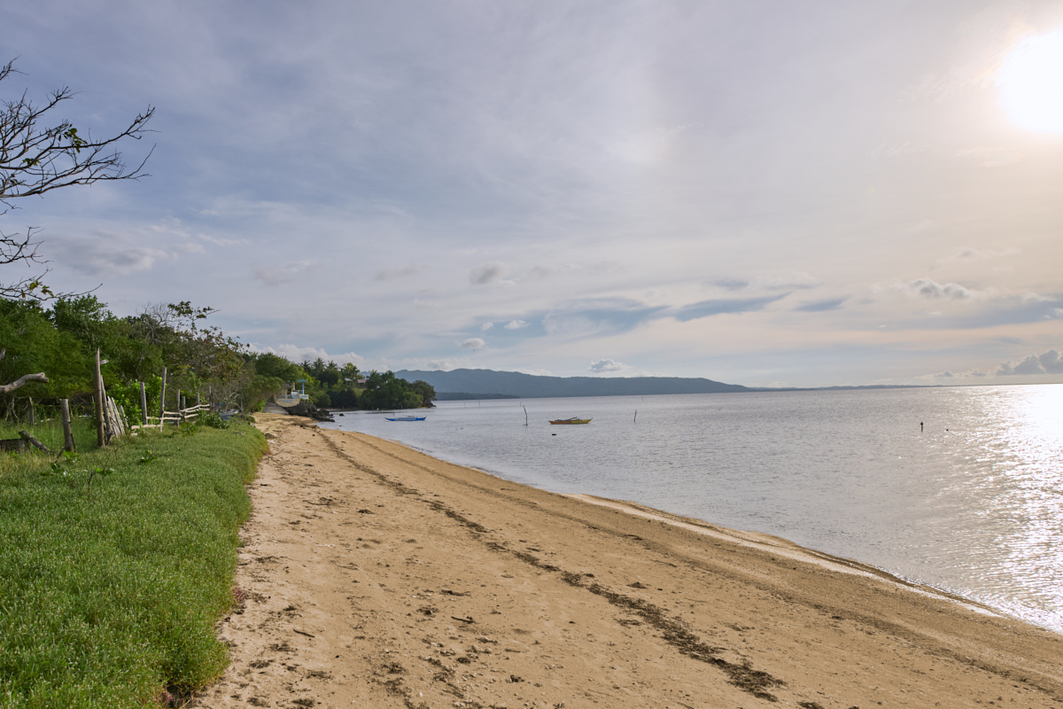 The natural beach and bay in the evening light