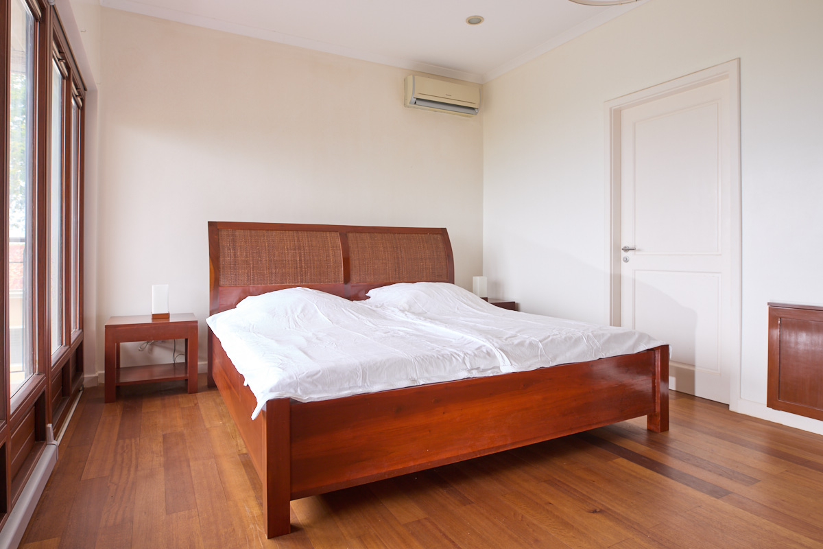 Upper-floor guest room with king-size bed