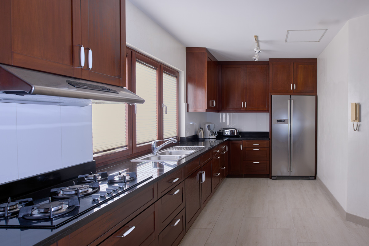Air-conditioned kitchen with gas cooker and refrigerator